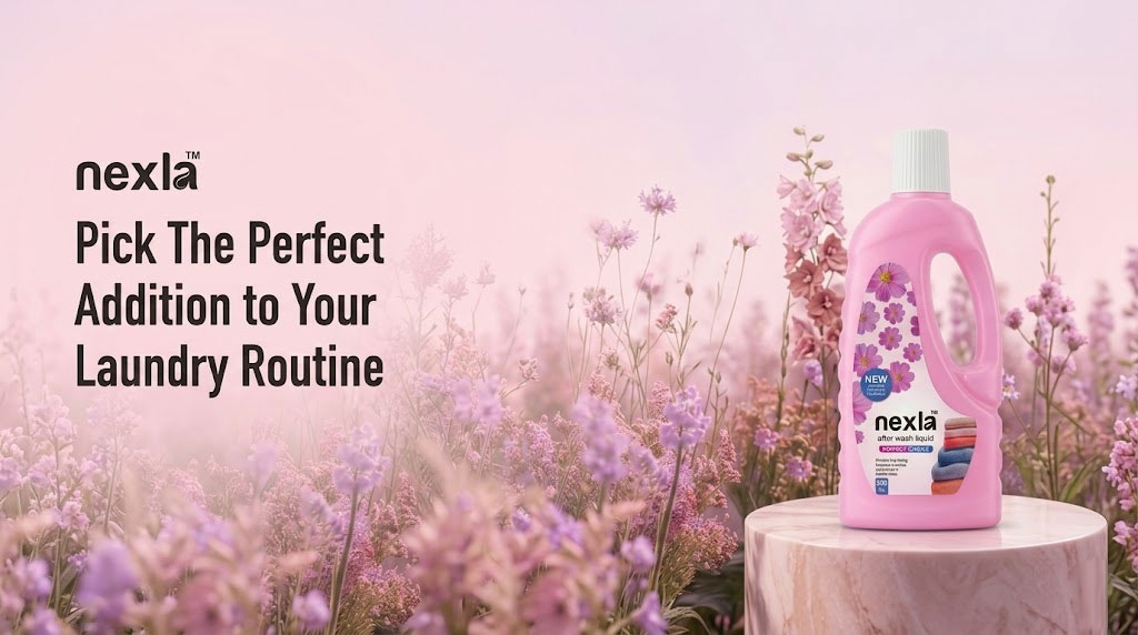 nexla after wash liquid fabric freshener 500 ml bottle next to freshly washed white towels – clean and fresh