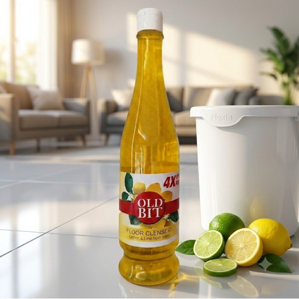 Nexla OLD BIT Lime Floor Cleaner bottle beside mop bucket on clean tile floor in modern living room